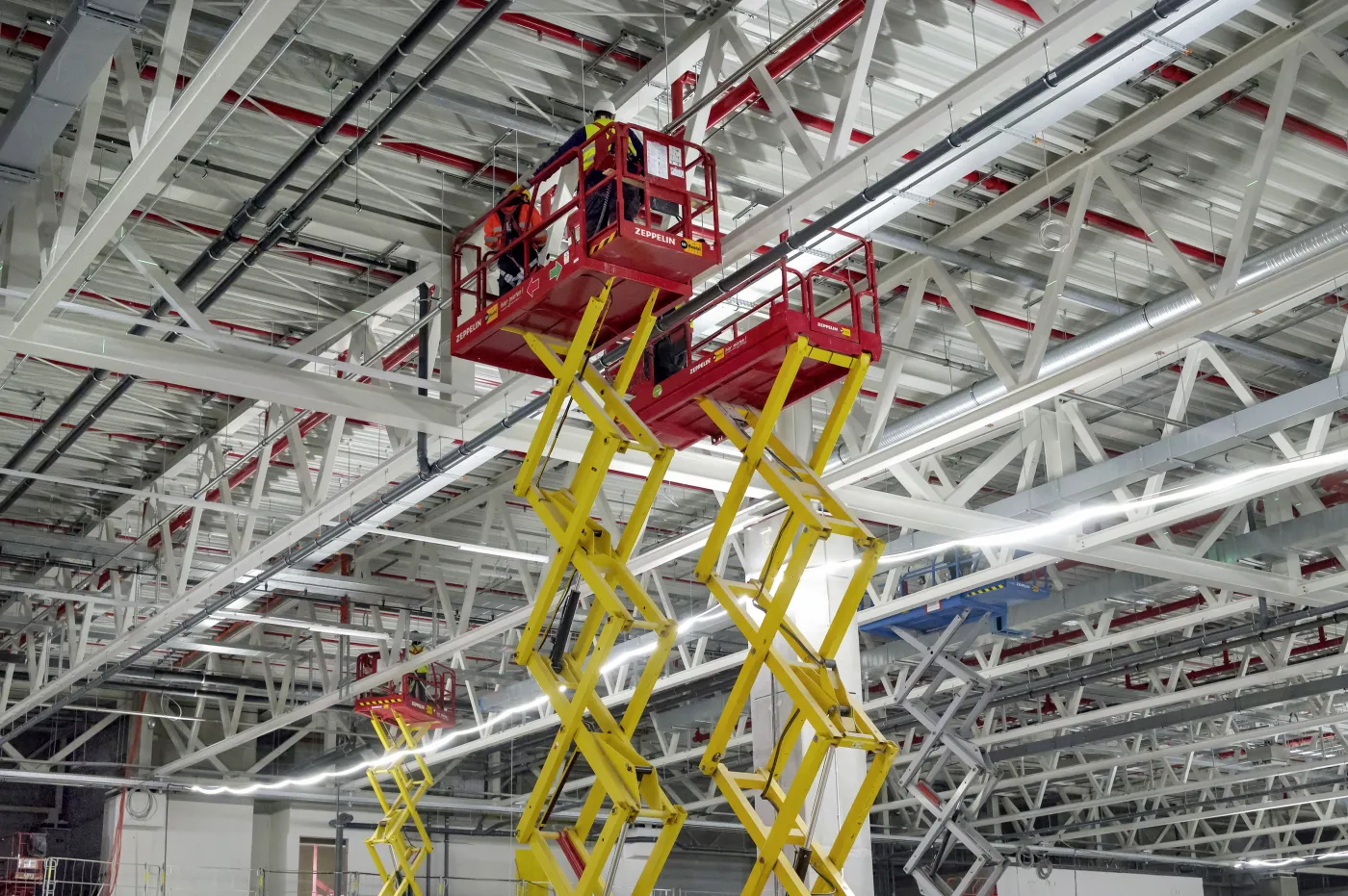 Scherenarbeitsbühnen Genie in Aktion